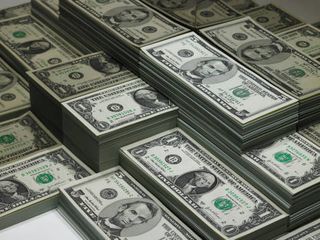Saving-money-tips-stacks-of-dollars-cash