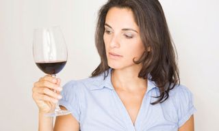 Woman-tasting-red-wine-009
