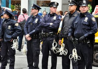 NYPD-officers-Occupy-Wall-Street-march.-March-24-2012