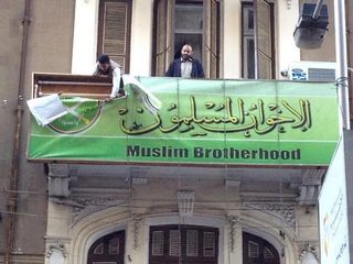 Egypt_MuslimBrotherhood_banner_Torn_down