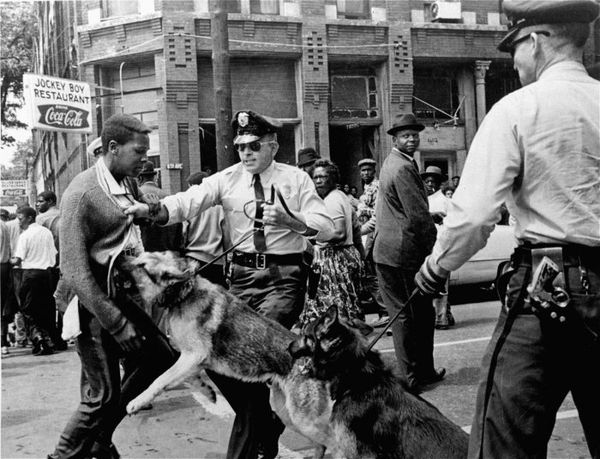 Bill Hudson is perhaps best known for capturing this galvanizing image of Parker High School student Walter Gadsden being attacked by police dogs in Birmingham, Alabama on May 3, 1963;