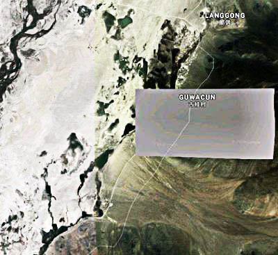 Google blots out the entire village of Guwacun in Tibet for some unknown reason.