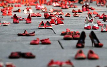 Red shoes, each pair for a dead or disappeared woman in Ciudad Juarez.