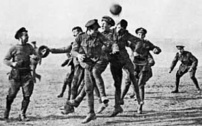 British and German soldiers play ball during the World War I Christmas Truce.
