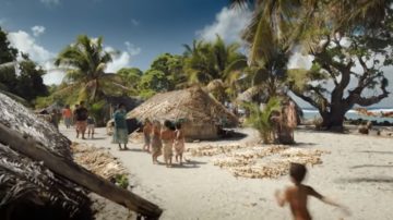 Image of people walking through a village on Tikopia island