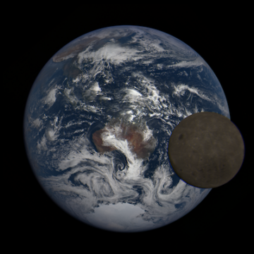 Image of Earth from space, with the moon crossing in front of it.