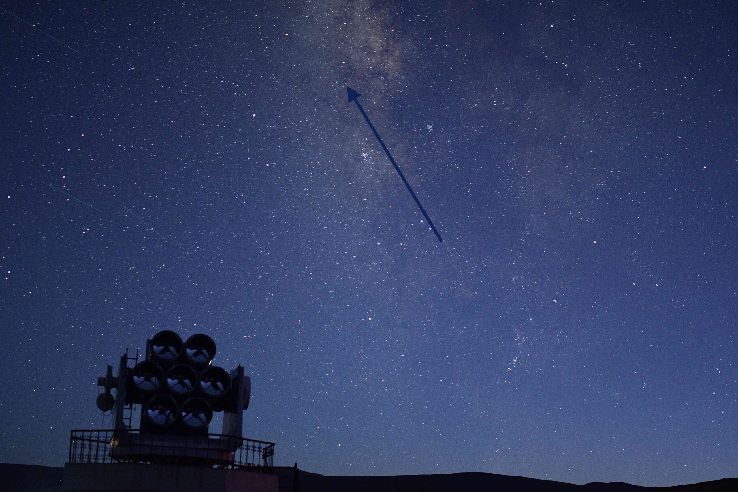 The arrow points to the dot