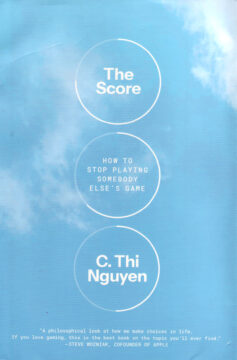 Cover of The Score. The cover's background is a picture of a cloudy sky, with wispy cloud on bright blue. Three dashboard-like gauges are superimposed on the background.