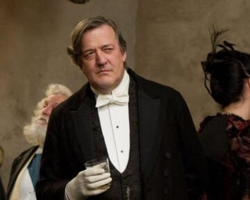 Stephen Fry as Mycroft Holmes